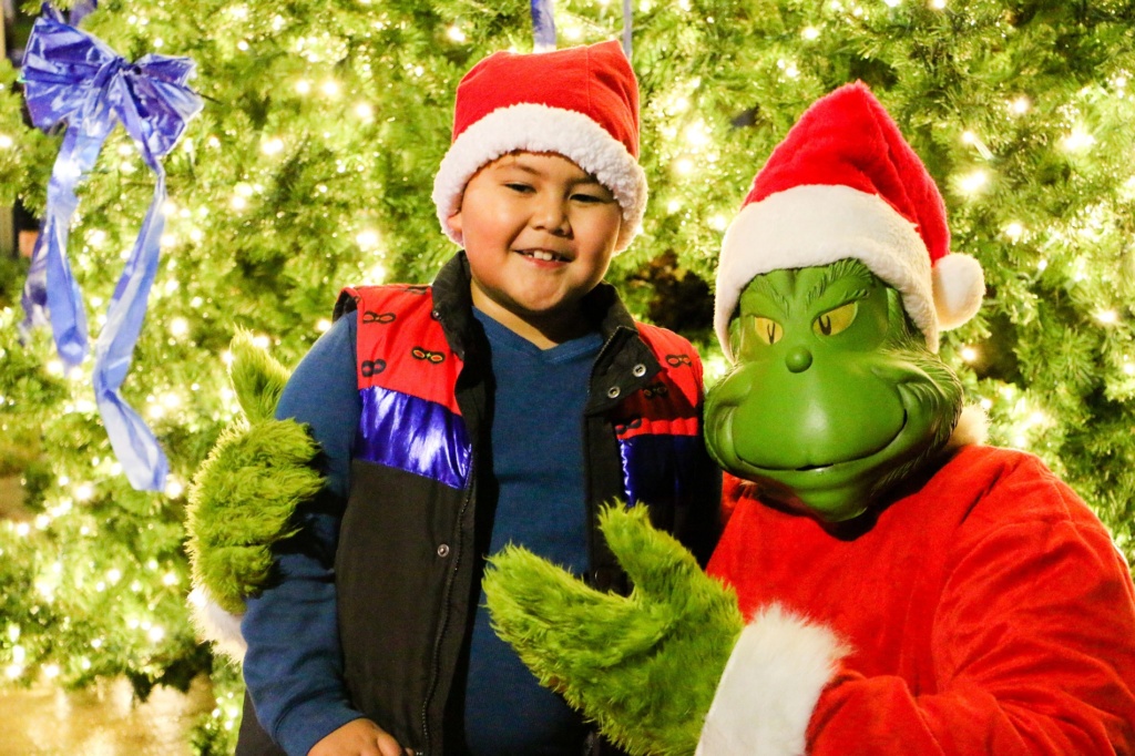 The Grinch poses for photos at the 23rd Annual Lakewood, WA Christmas Tree Lighting festivities