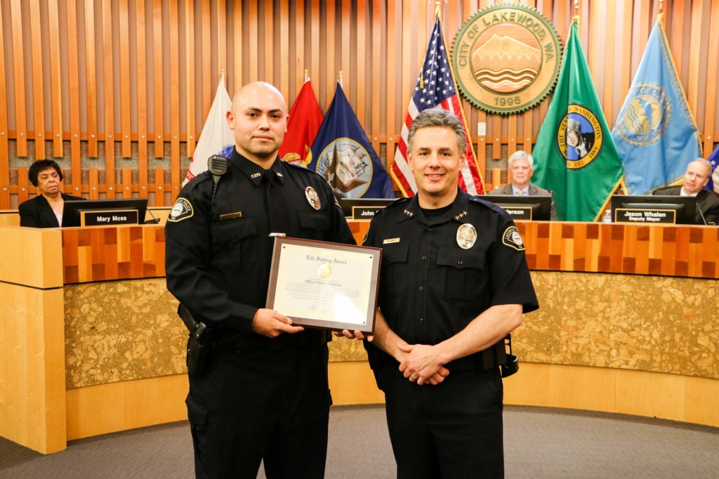 Lakewood Police Chief Mike Zaro recognizes a Lakewood Police Officer for their life-saving efforts in 2019