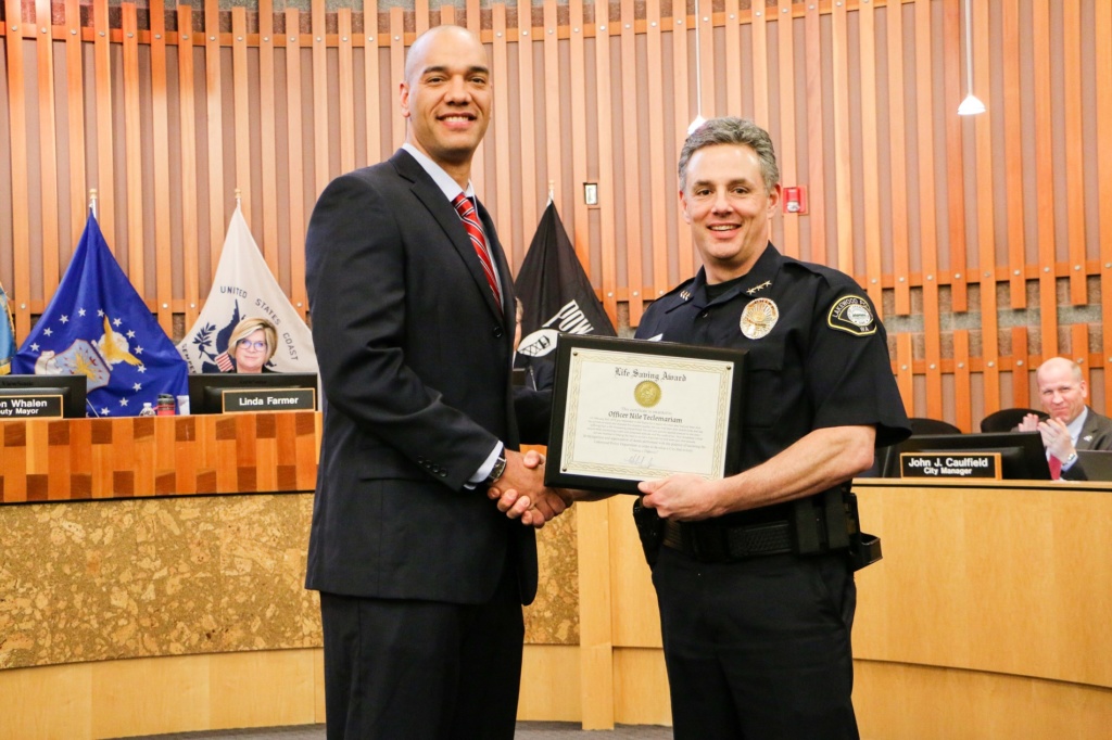 Lakewood Police Chief Mike Zaro recognizes a Lakewood police officers for their life-saving efforts in 2019