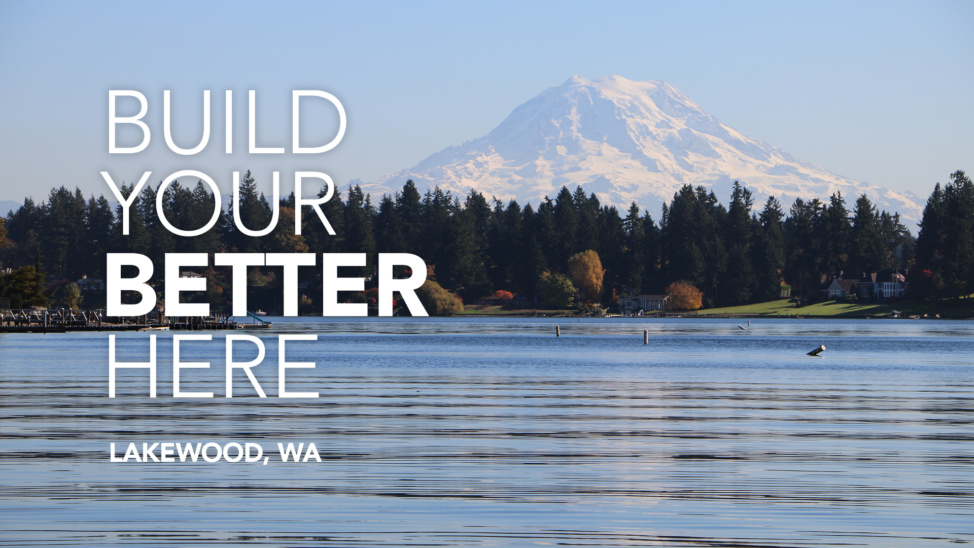 American Lake with Mount Rainier in the background and Build Your Better Here Lakewood, WA on the left side of the image