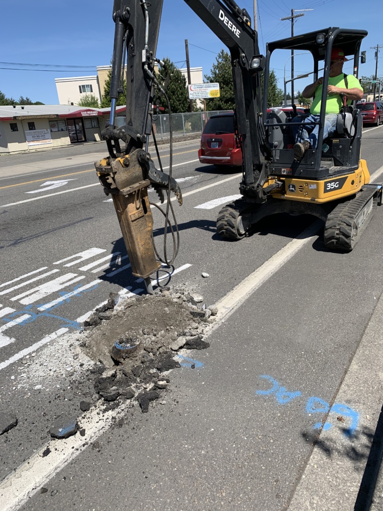 108th St. Overlay-Drilling out a valve for future paving