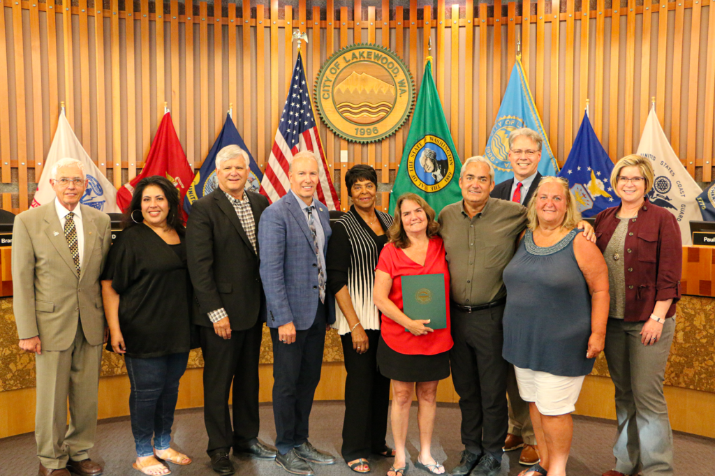 Lakewood, WA City Council presenting proclamation to the family of George Weyerhaeuser Sr