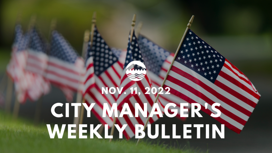 Nov. 11, 2022 City Manager's Weekly Bulletin. Text over an image of American Flags.