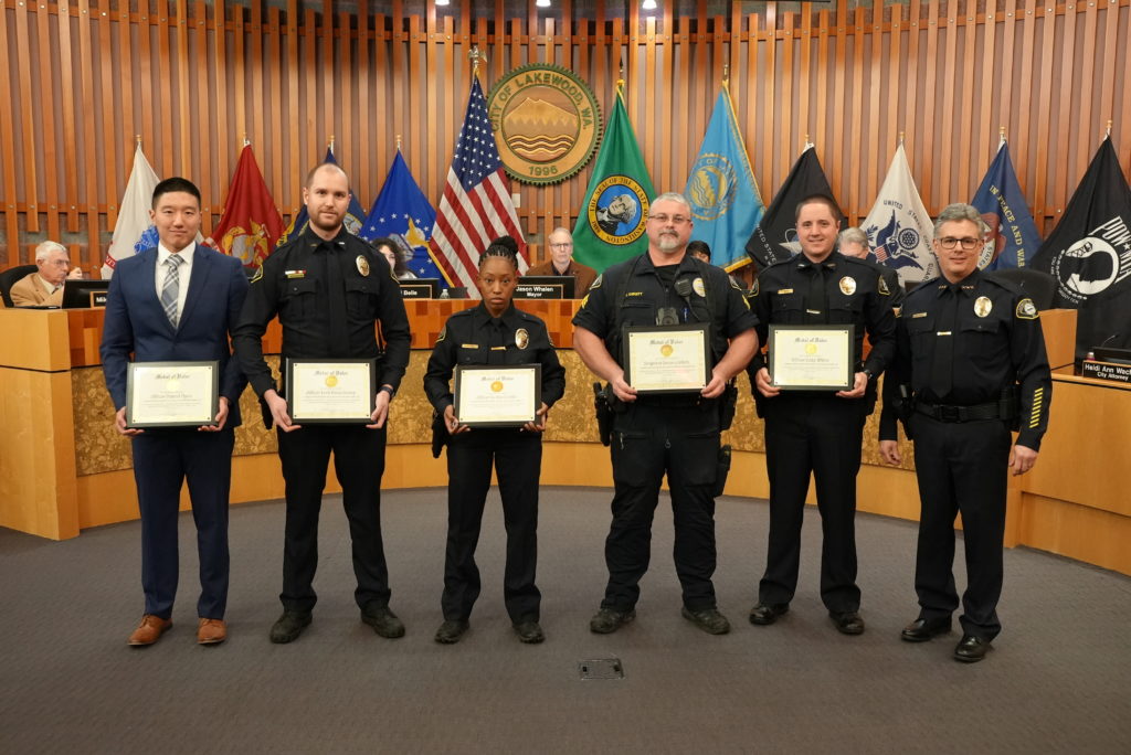 Lakewood Police Officers receive Medals of Valor from Chief Zaro.