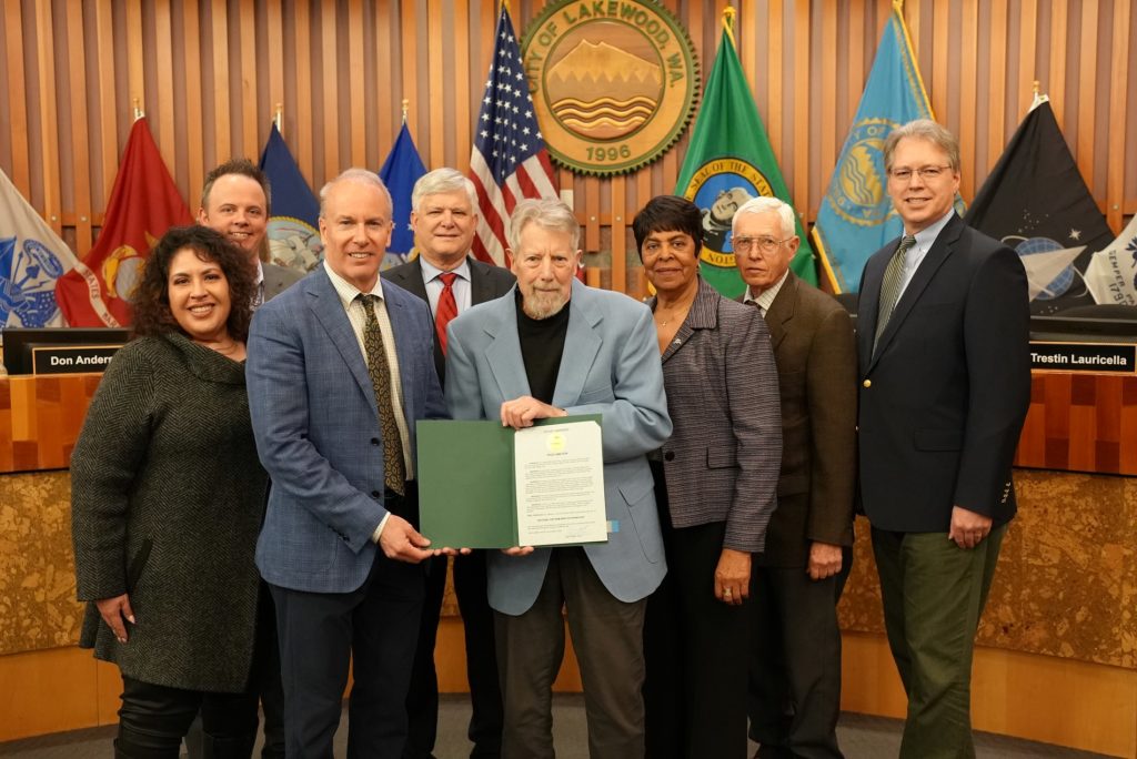 Lakewood City Council with Bob Warfield, presenting him a proclamation for Vietnam War Veterans Day.