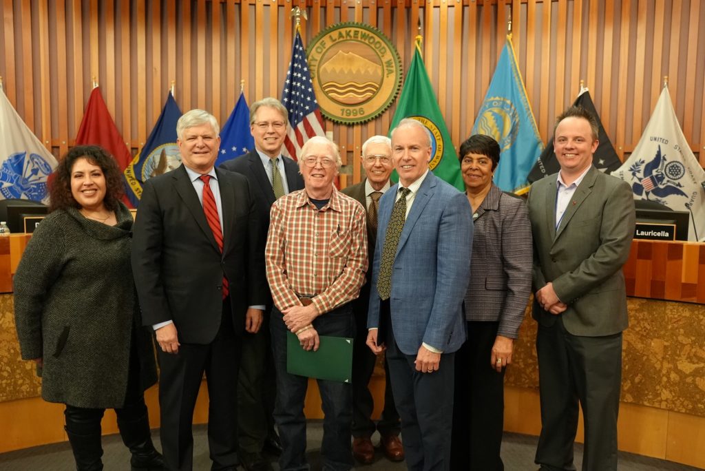 The Lakewood City Council with volunteer Scott McKay