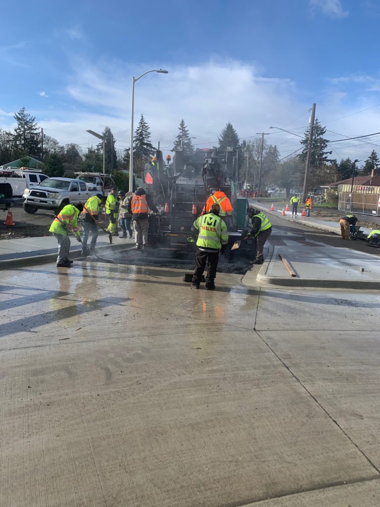 A photo of crews paving Washington Boulevard in Lakewood WA
