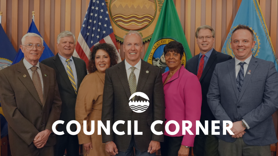 Photo of the Lakewood City Council with white text over the image that reads Council Corner.