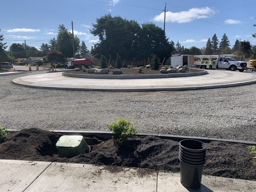 A picture of the new roundabout at 87th Ave/Dresden Lane/Elwood Drive.
