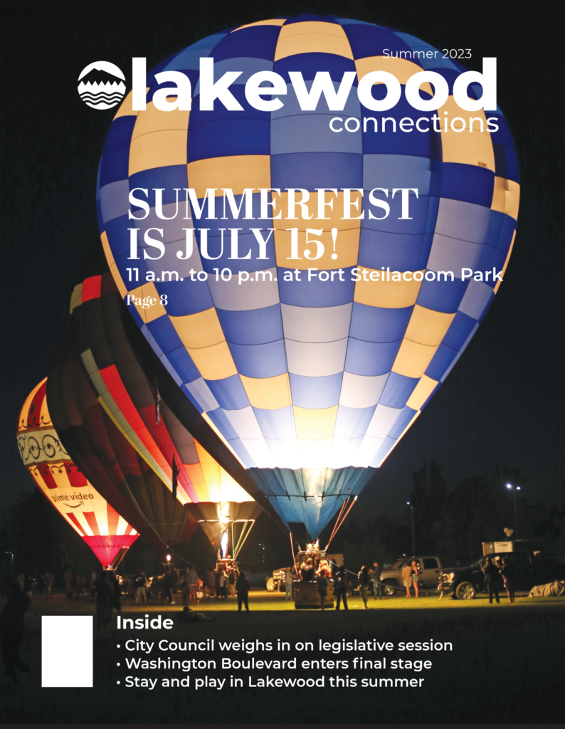 An image of the cover of the Summer 2023 Lakewood Connections Magazine. The photo is of hot air balloons tied to the ground and lit up at night at SummerFEST.