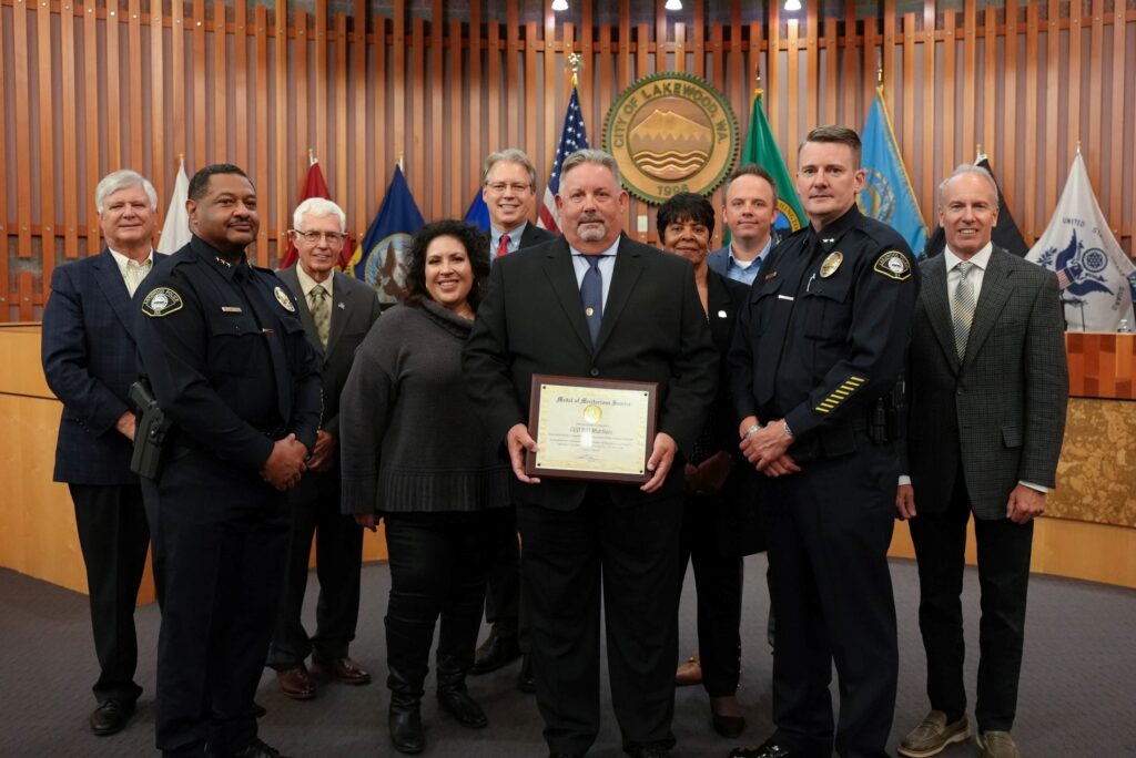 Code Enforcement Officer Bill Mathies poses with the Lakewood City Council