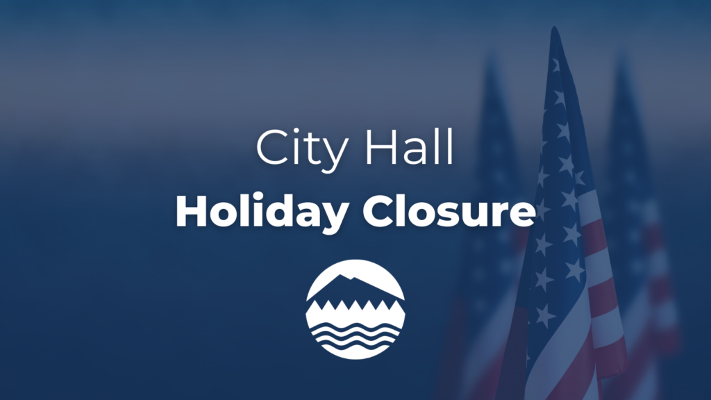 White text reads City Hall Holiday Closure over an image of American flags