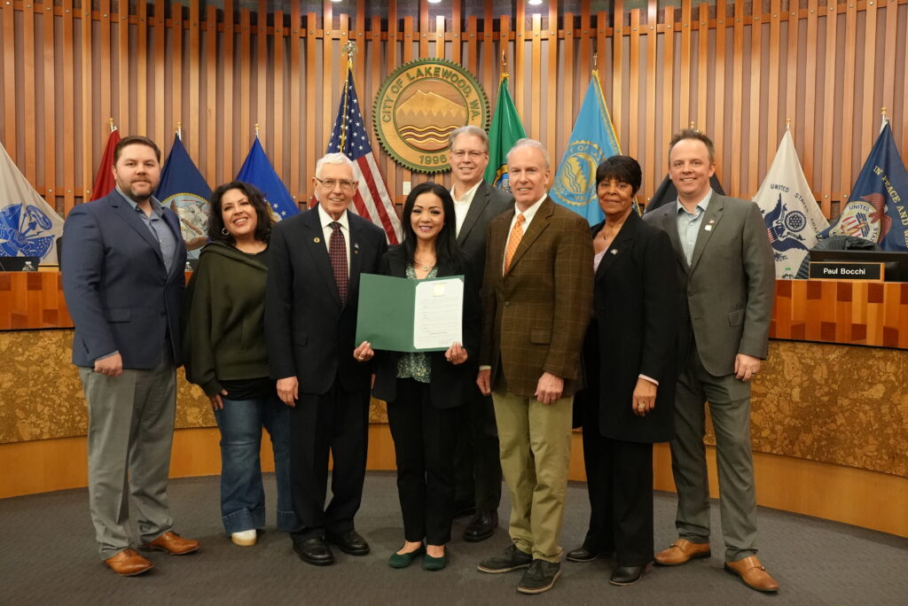 The Lakewood City Council poses with Deputy City Manager Tho Kraus after declaring March 2024 Women's History Month.