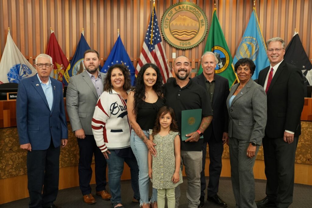 Members of the Lakewood City Council pose with small businses owner Abraham Moreno who owns Sugar Bones Tacos. He was given a proclamation recognizing September 2024 as National Hispanic Heritage Month.