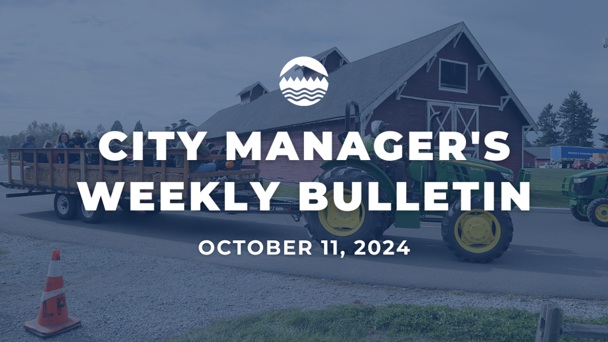 City Manager's Weekly Bulletin Oct. 11, 2024 image of a barn and tractor pulling a wagon of people is behind the text.