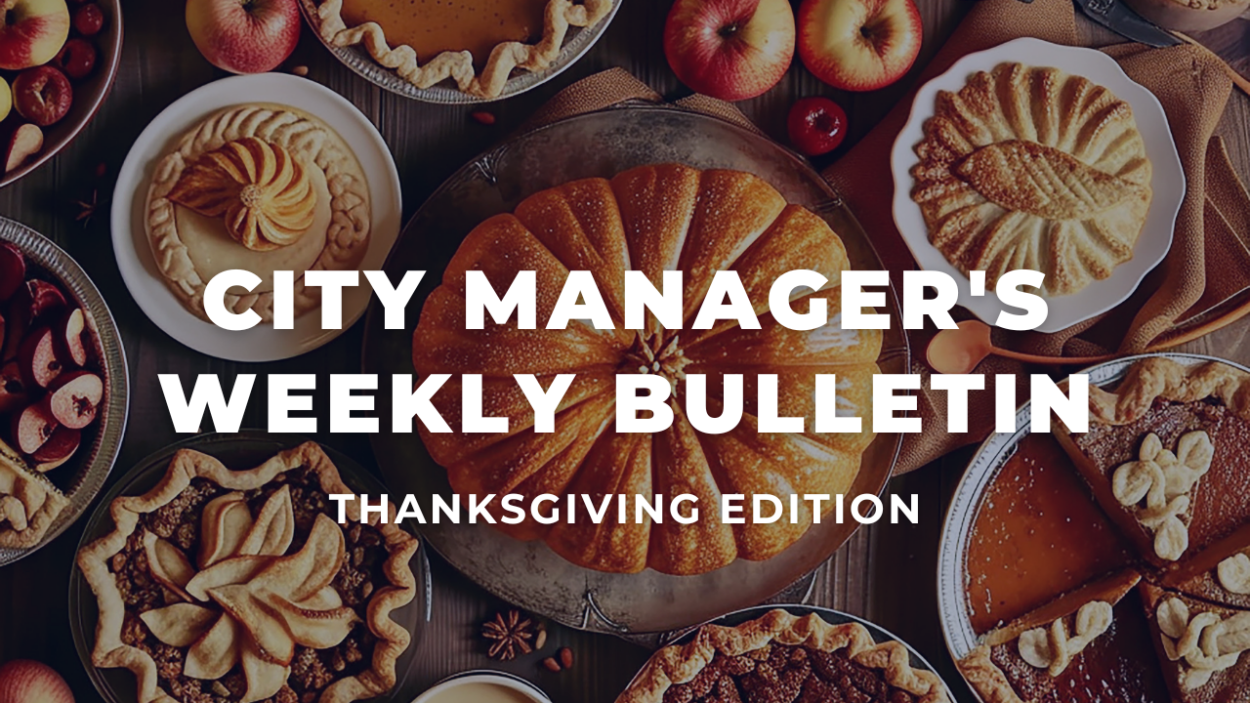 An image of fall themed desserts and a large baked pumpkin shot from overhead. The words City Manager's Weekly Bulletin Thanksgiving Edition are in white over the image.