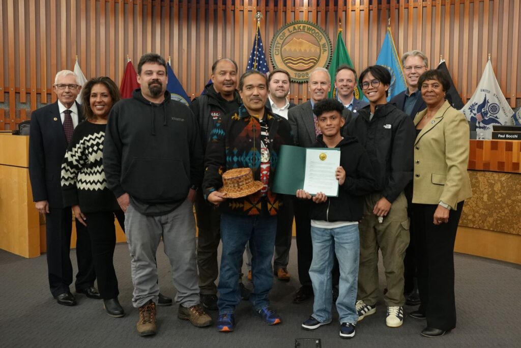 Members of the Nisqually Indian Tribe pose with the Lakewood City Council and two members of the Lakewood Youth Council after receiving a proclamation recognizing Native American Heritage Month.