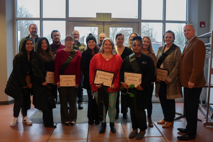 A group of Lakewood employees pose for a photo after being recognized with a 2024 Guiding Principle Award for their work on the city's Diversity, Equity, Inclusion and Belonging Action Pillar development.