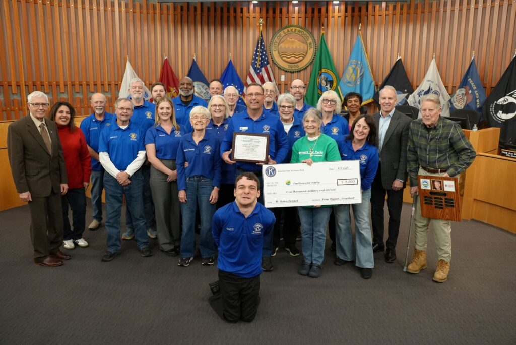 Members of the Kiwanis Club of Clover Park pose wiht the Lakewood City Council after receiving the Larry Saunders Service Award