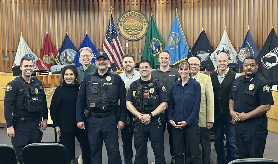 The Lakewood City Council poses with Lakewood Police Chief Patrick D. Smith and members of the Lakewood Police Department who were recognized for annual awards. They include Officer Josh Repp, Sgt. Charles Porche, Officer Jack Johnson and Detective Karen Latimer. Not pictured is Svea Pitts.