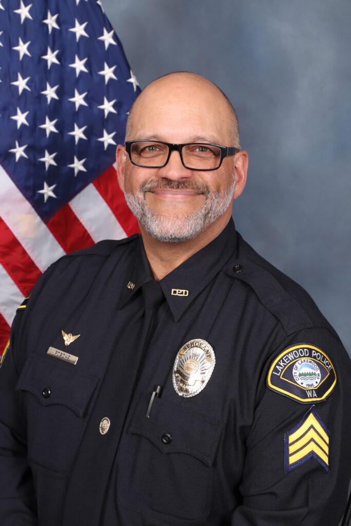 Professional headshot of Lakewood Police Sgt. Charles Porche.