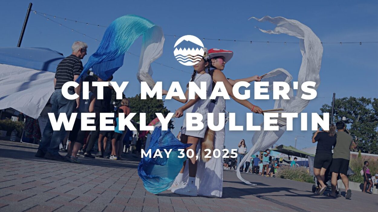 White text reads City Manager's Bulletin May 30, 2025 over an image of two people waving large silk cloth at a city event