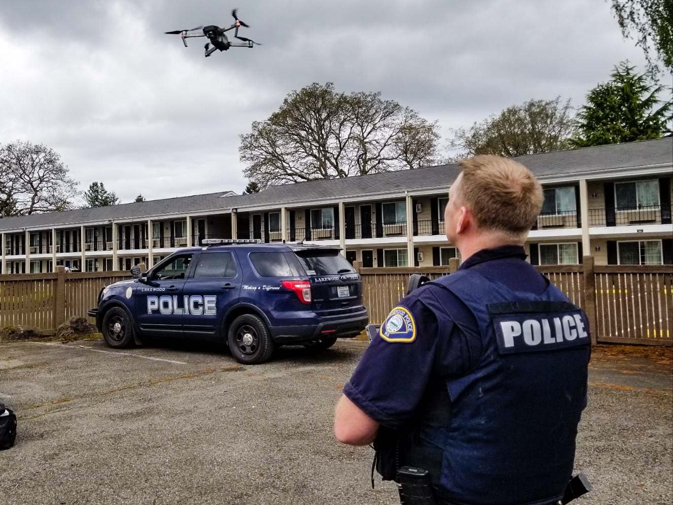Officer Shawn Noble flies the LPD drone at the Best Western in Lakewood to capture overhead images of Colonial Center Plaza construction
